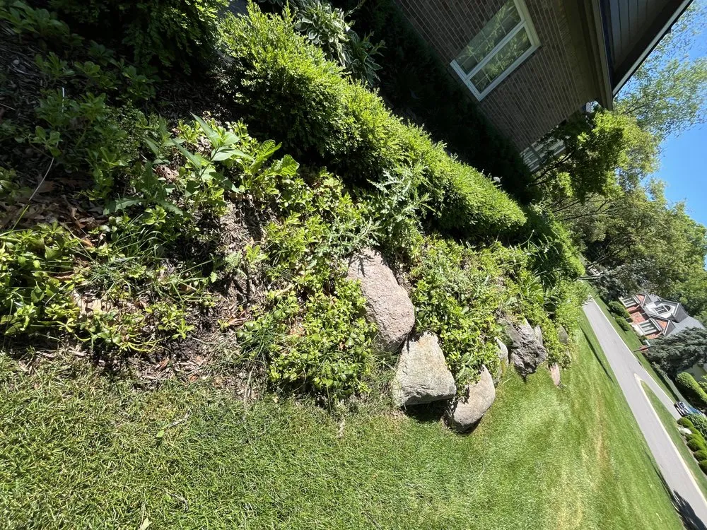 Custom outdoor landscaping for residential properties in White Lake, MI by Garden Glory Creations