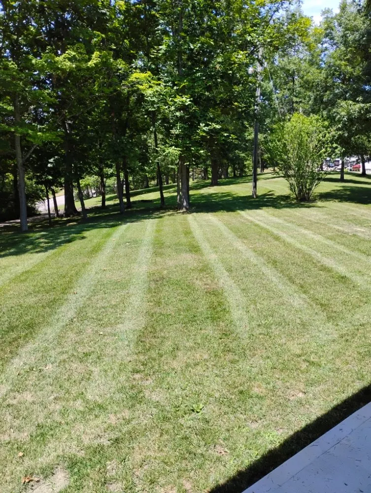 Custom lawn mowing service with custom design in Butler, KY by Garden Gurus