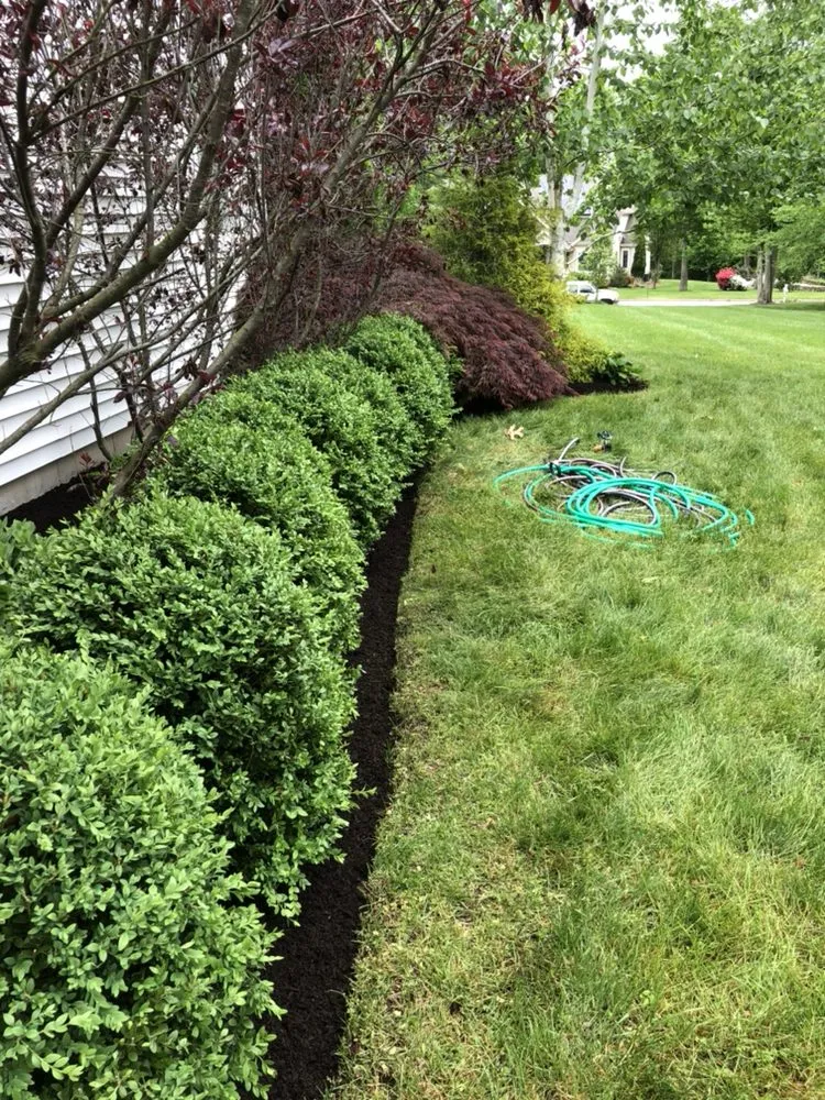 Local garden landscaping for beautiful yards in East Lyme, CT by Garden Guys