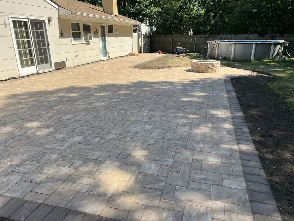 Trusted lawn mowing service in Massapequa Park, NY by Garden Scapes