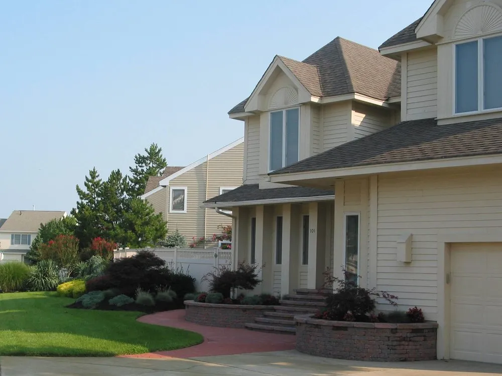 Professional lawn mowing service for homes in Evesham, NJ by Gardencrest II Landscaping & Property Maintence