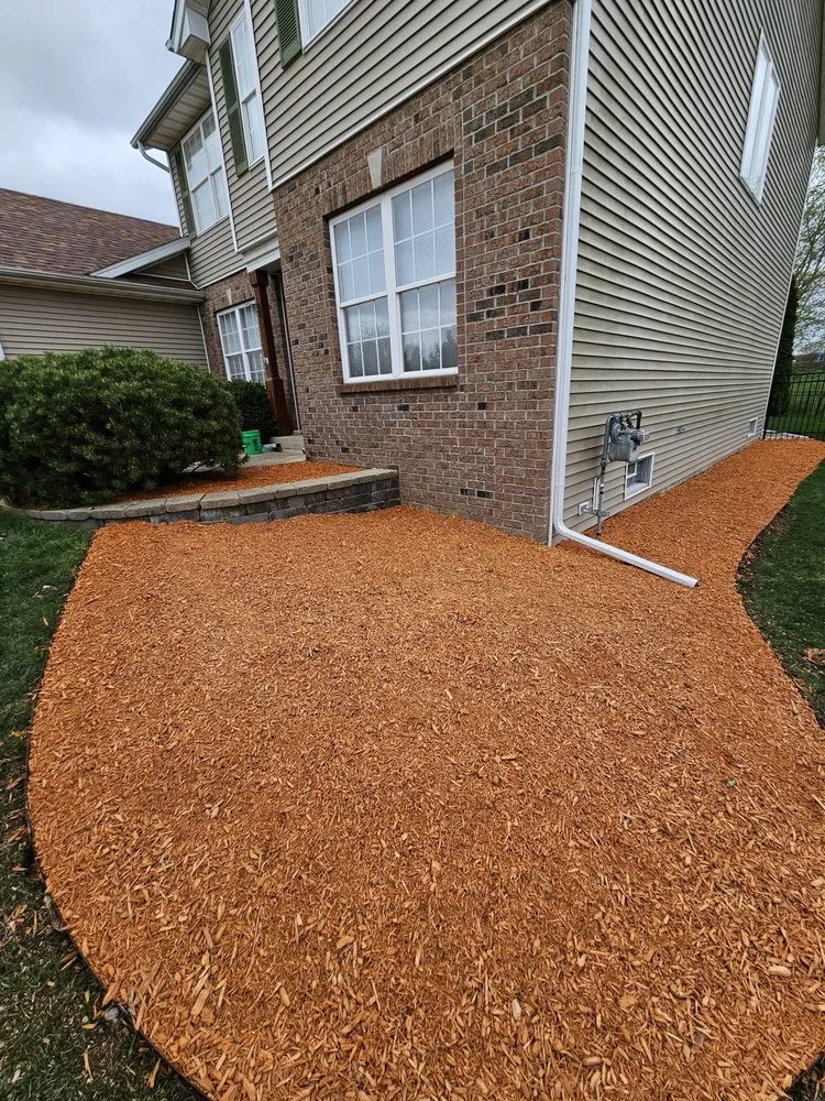 Custom lawn mowing service with custom design in South Beloit, IL by Gardening America