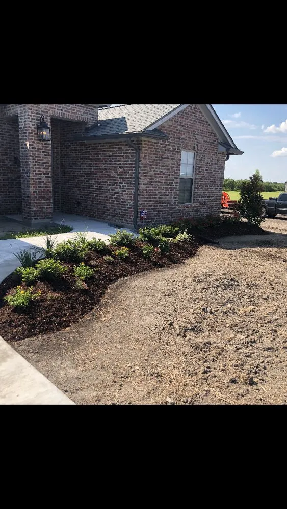 Custom landscape design for year-round maintenance in New Iberia, LA by Gardening By Zac