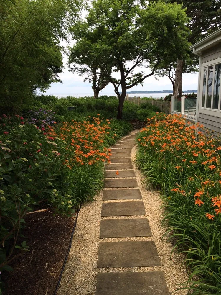 Reliable lawn mowing service for outdoor upgrades in Port Jefferson Station, NY by Gardens by J Tortomasi