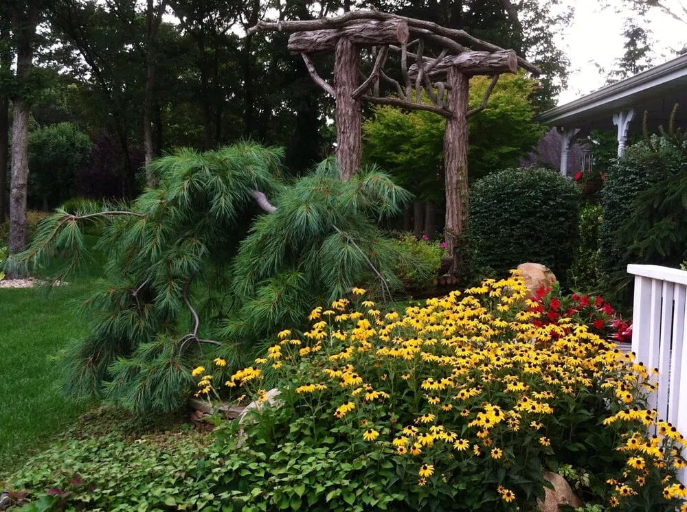 Professional landscaping services experts serving Port Jefferson Station, NY - Gardens by J Tortomasi