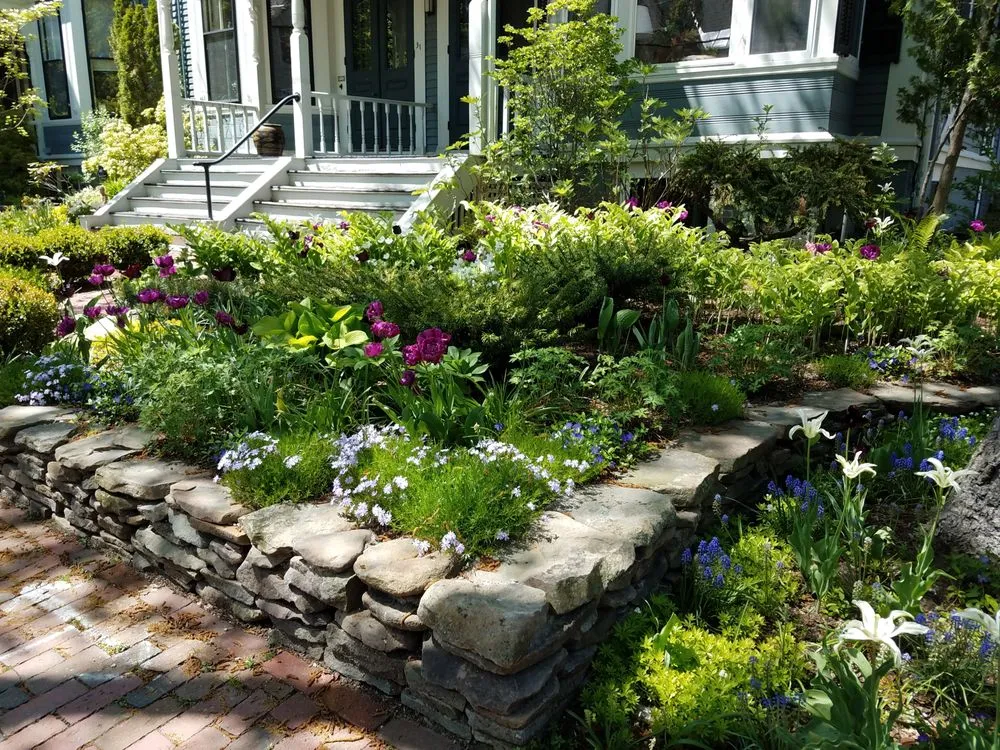 Trusted lawn mowing service for beautiful yards in Belmont, MA by Gardens By Suniti