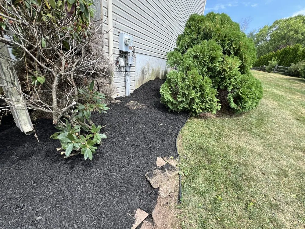 Custom outdoor landscaping for year-round maintenance in Shillington, PA by Gardens Gone Raised