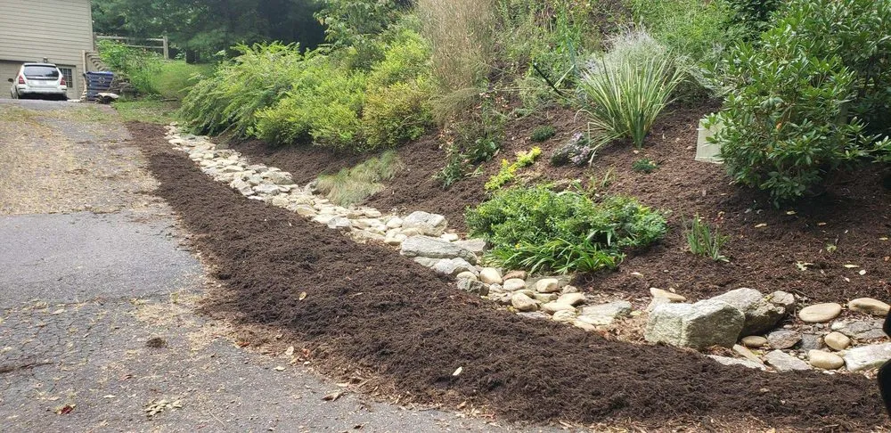 Reliable lawn care service in Asheville, NC by Gardens of Eatin Landscaping