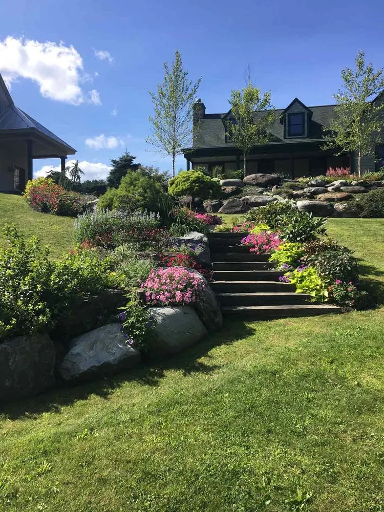 Professional yard maintenance in Stowe, VT by Gardens of Eden