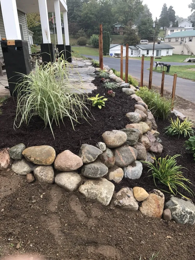 Custom outdoor landscaping for residential properties in Fremont, IN by Gardner Outdoor Design