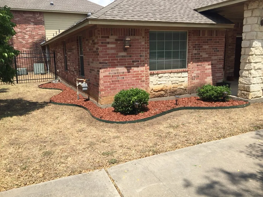 Custom lawn care service for residential properties in Fort Worth, TX by Gardner's Touch Lawn Care