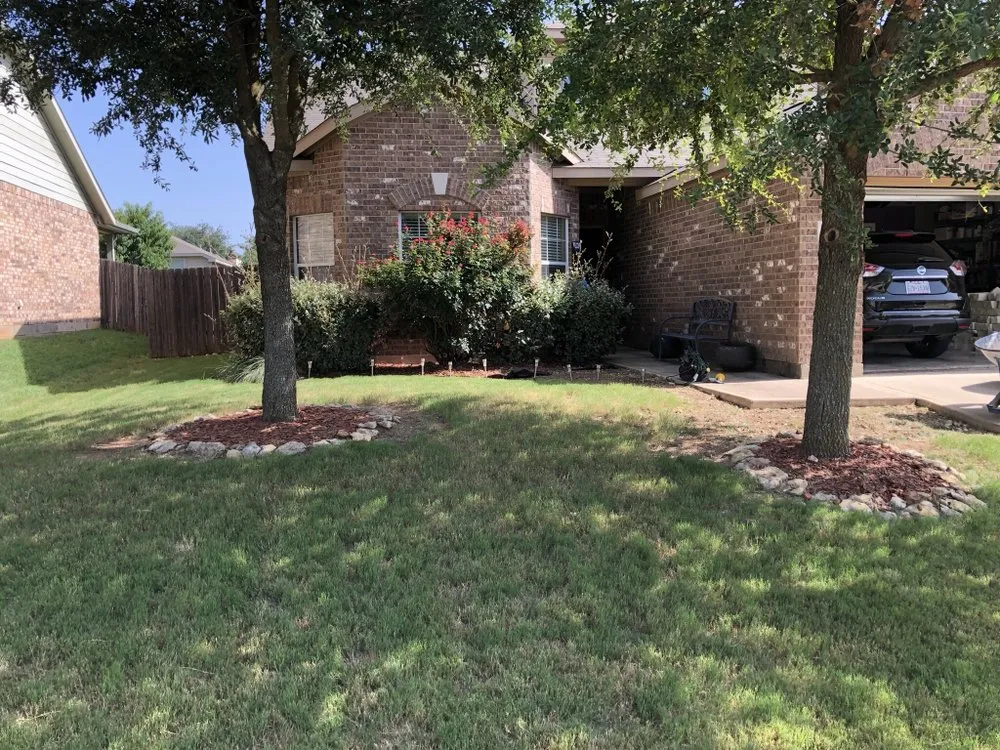 Custom garden landscaping for beautiful yards in Fort Worth, TX by Gardner's Touch Lawn Care