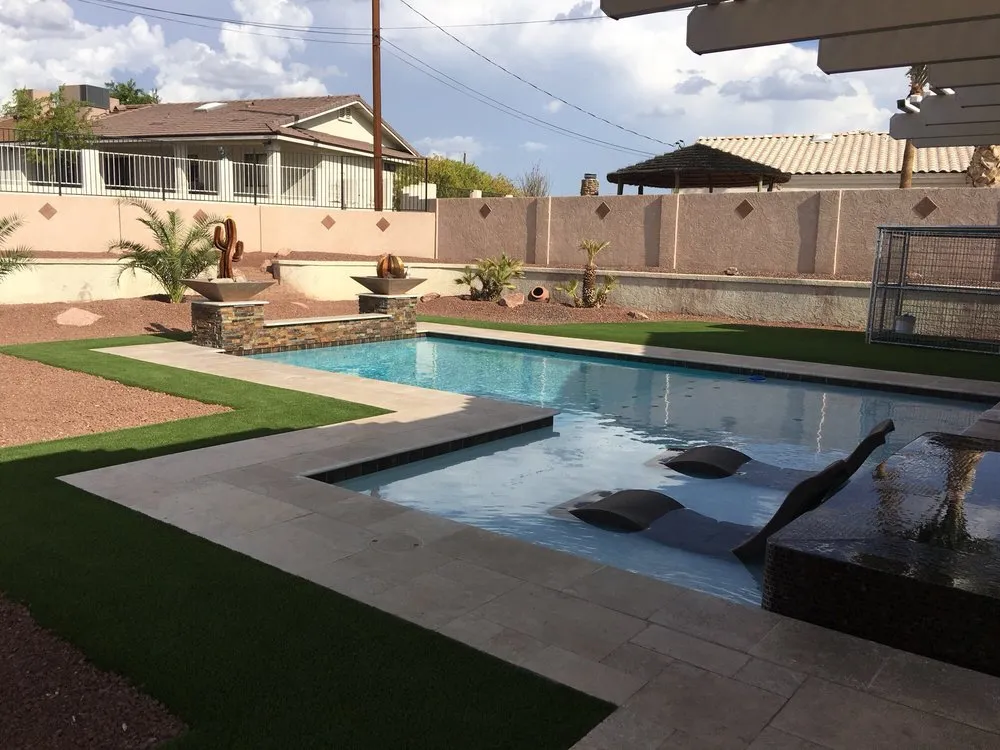 Affordable lawn care service with custom design across Lake Havasu City, AZ - Garitee Landscapes & Bobcat Service
