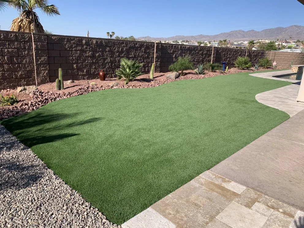 Professional lawn mowing service with custom design across Lake Havasu City, AZ - Garitee Landscapes & Bobcat Service