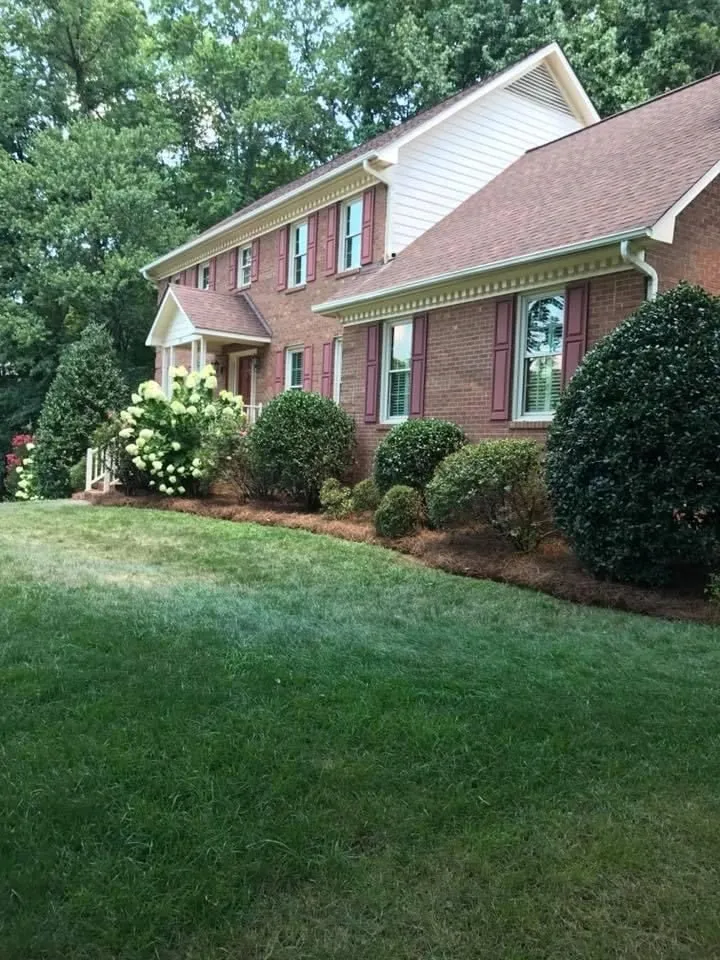 Custom landscape design for homes in Colfax, NC by Garland Landscaping