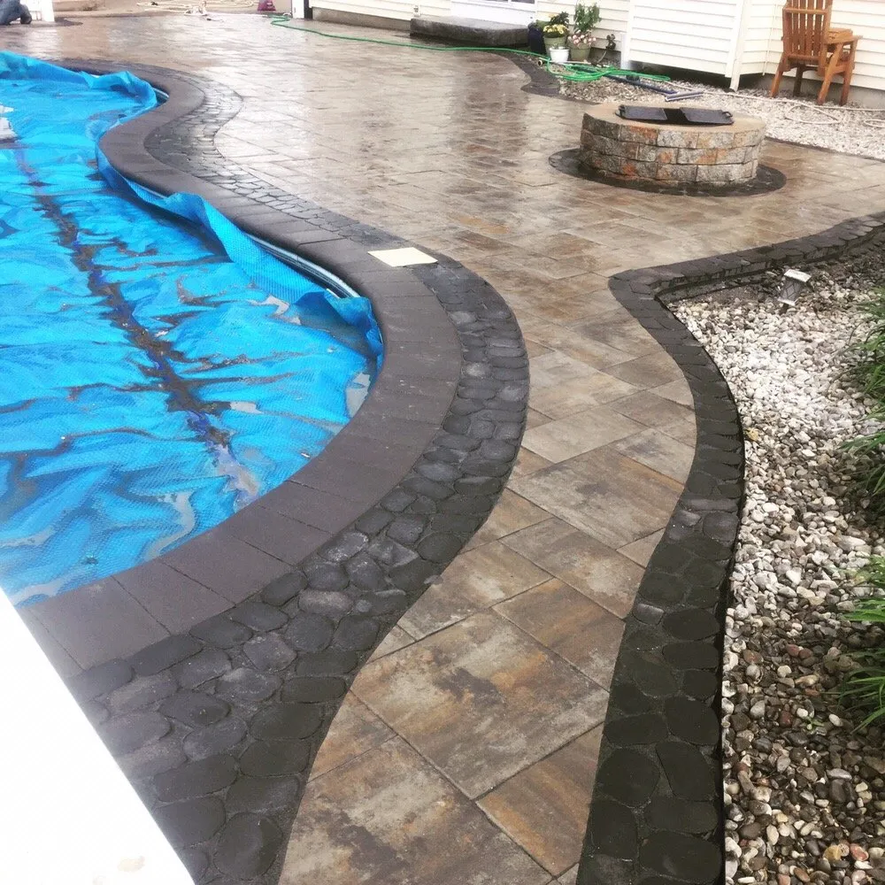 Custom lawn care service with custom design across Baldwinsville, NY - Garrison Companies