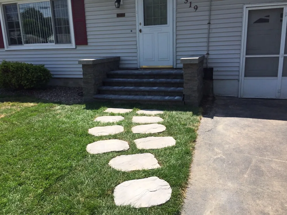 Professional yard cleanup service for homes across Baldwinsville, NY - Garrison Companies