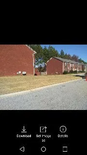 Custom landscape installation in Lithonia, GA by Garrisons Grasscutters