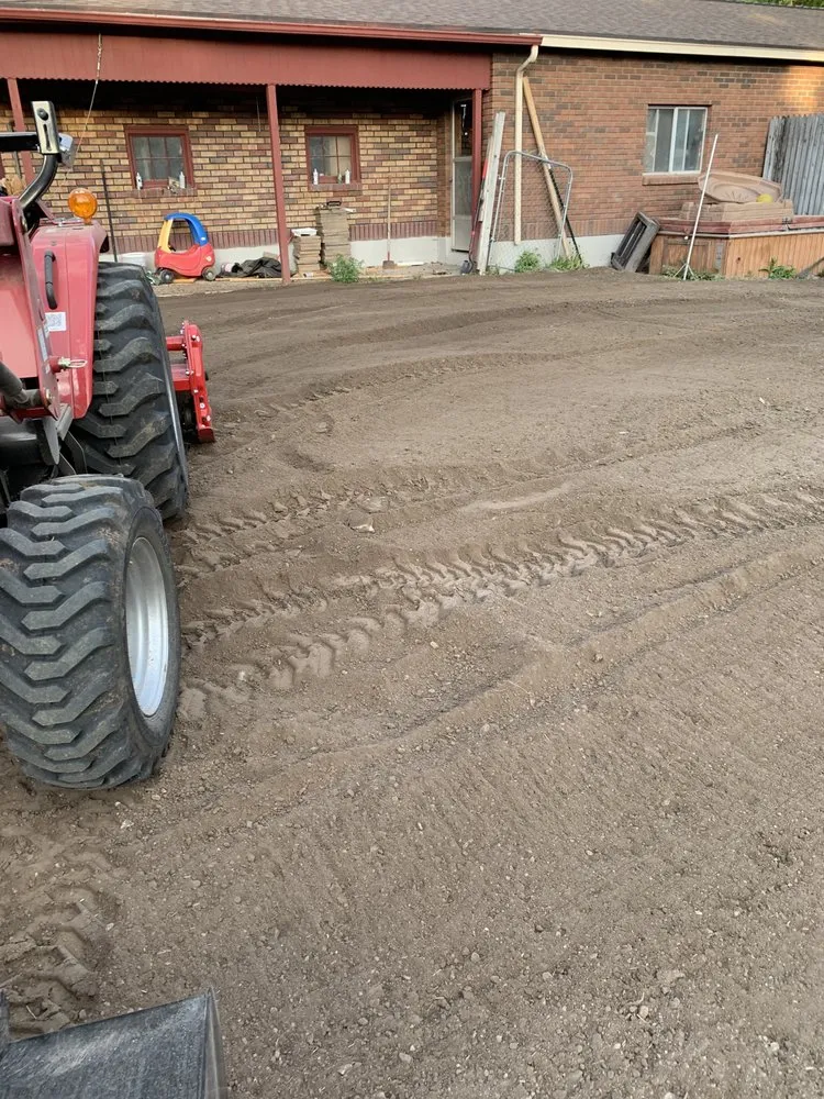 Expert lawn care service experts serving Smithfield, UT - Gary’s Little Red Tractor