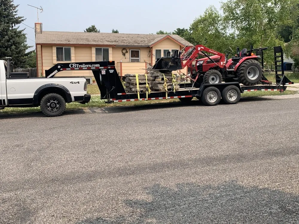 Expert lawn mowing service for beautiful yards in Smithfield, UT by Gary’s Little Red Tractor