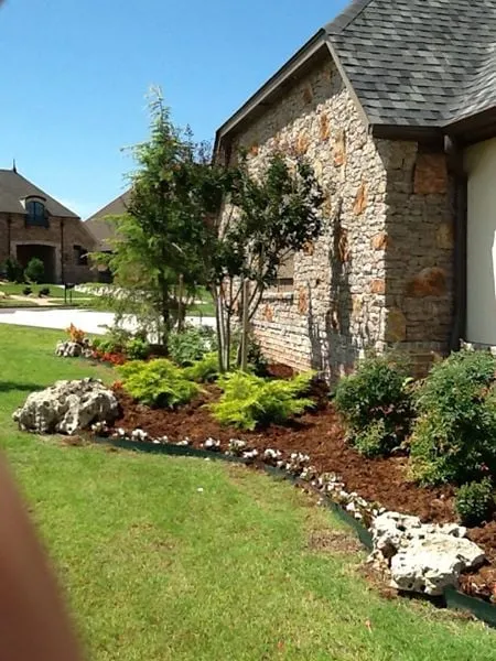 Trusted lawn mowing service in Moore, OK by Garza's Green Grass