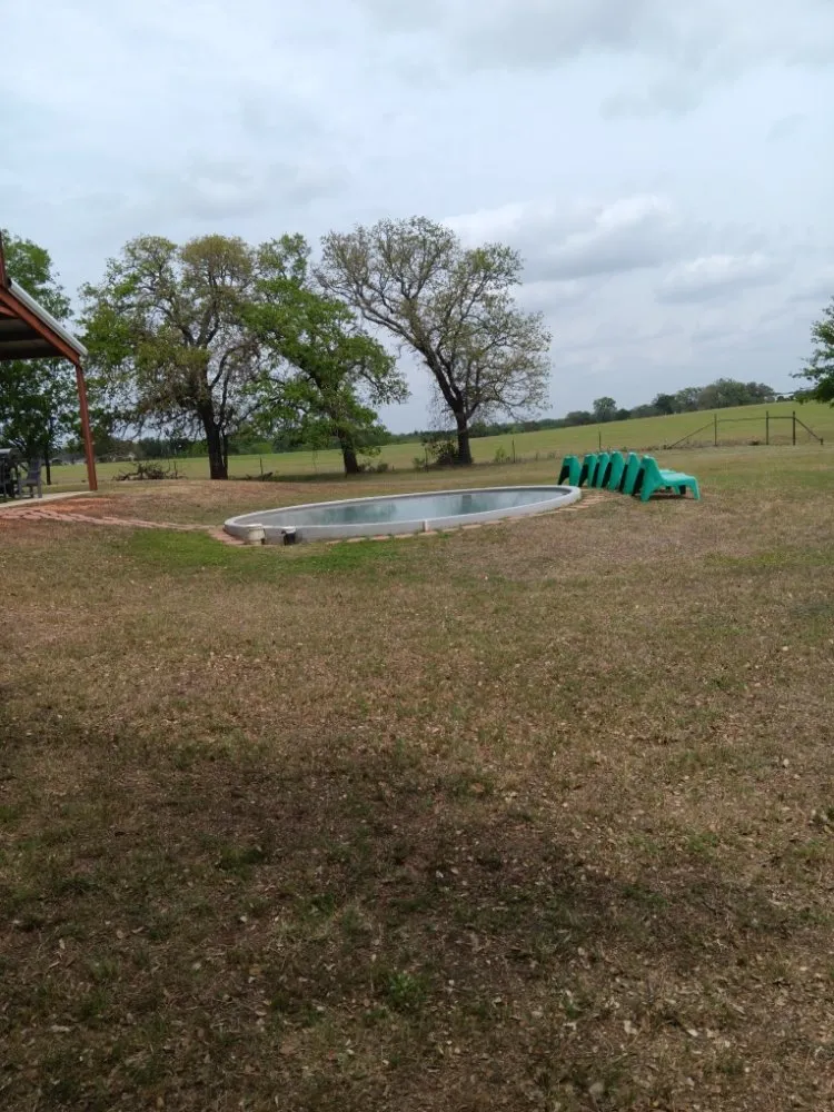 Affordable yard maintenance with custom design in Fredericksburg, TX by Gatos Landscaping
