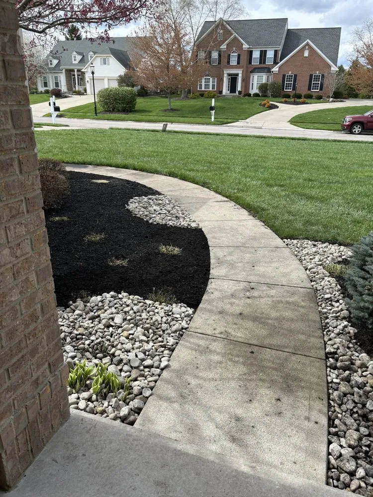Professional yard cleanup service for homes in Cincinnati, OH by Geiger Greenscapes