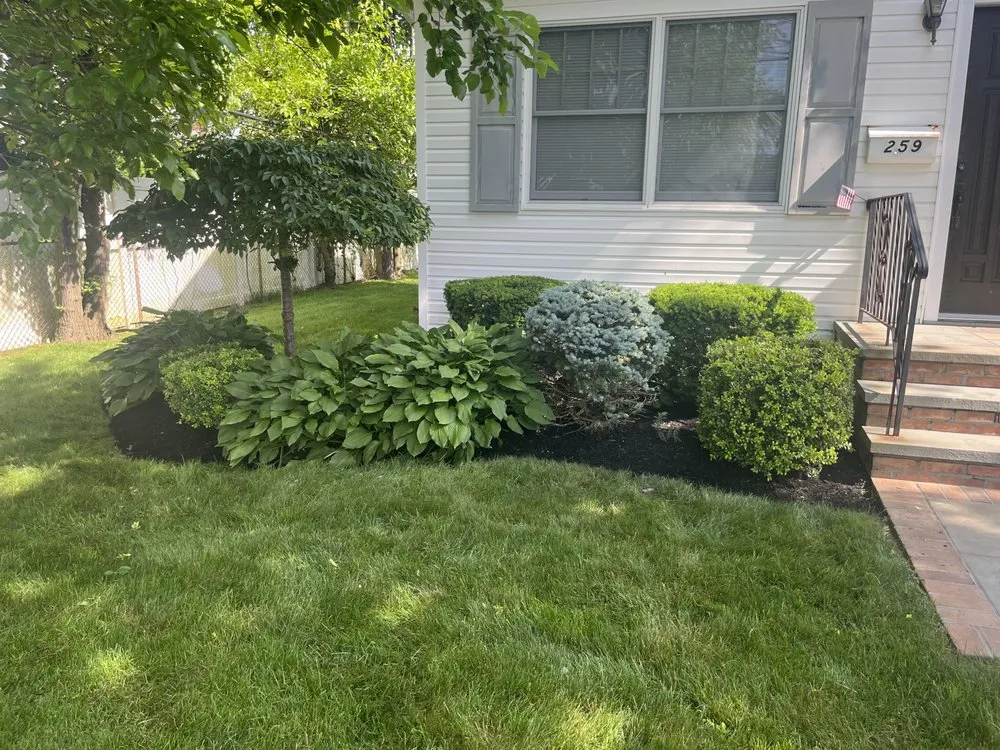 Custom garden landscaping with custom design in Deer Park, NY by Gem landscaping