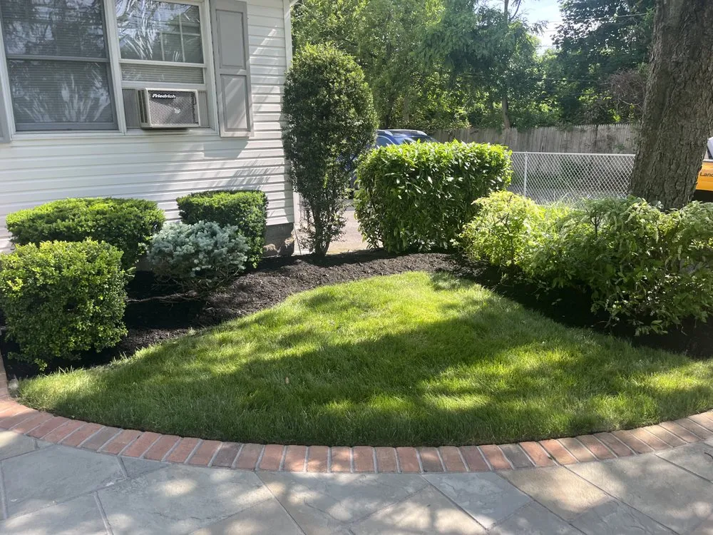 Trusted lawn care service with custom design in Deer Park, NY by Gem landscaping