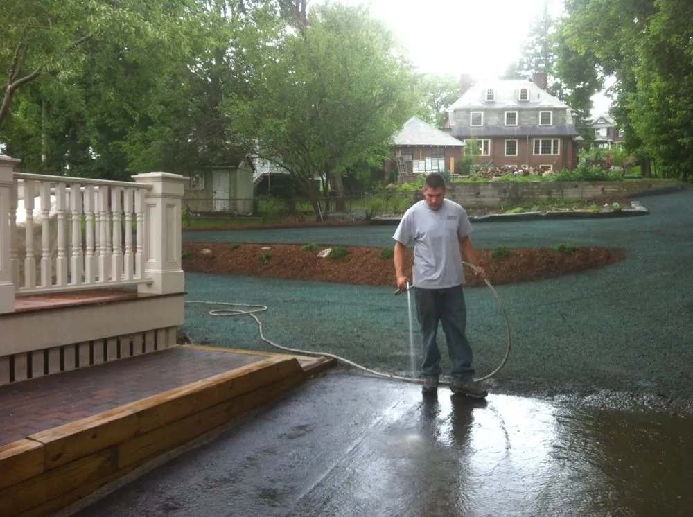 Custom landscape design for year-round maintenance in Dedham, MA by General Landscape Corp