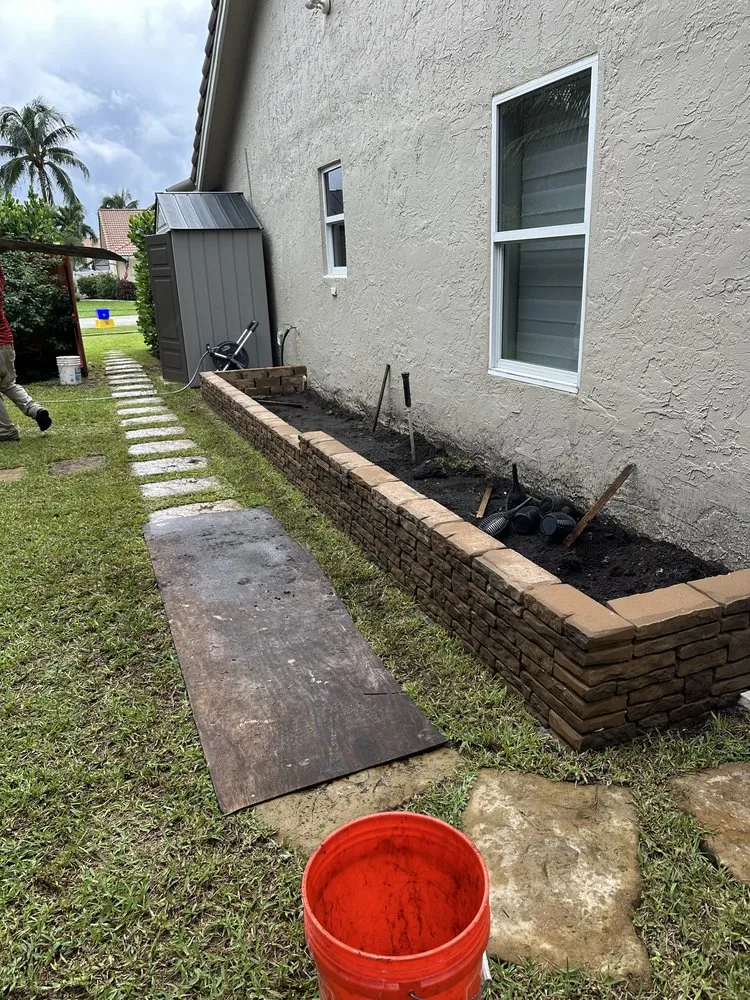 Reliable yard maintenance for year-round maintenance in Lake Worth Beach, FL by Genesis Design Scape Services