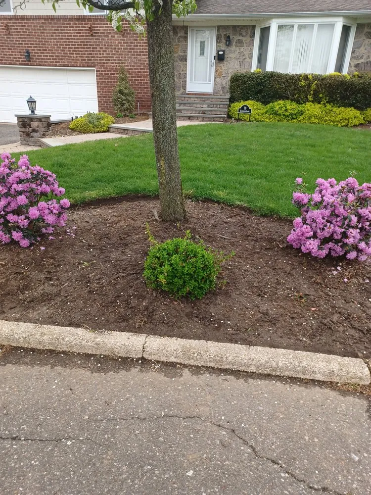 Custom landscape installation in Deer Park, NY - Genesis Landscaping