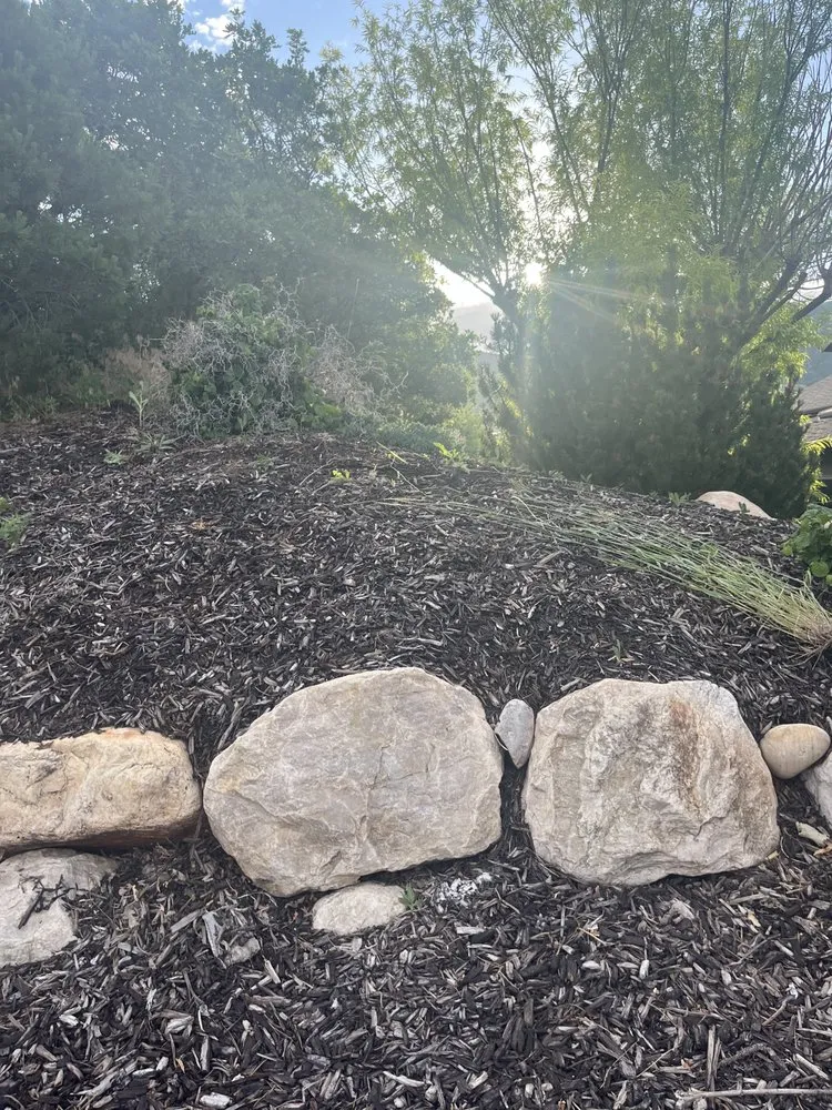 Custom lawn mowing service for residential properties in Layton, UT by Genesis Lawn Care