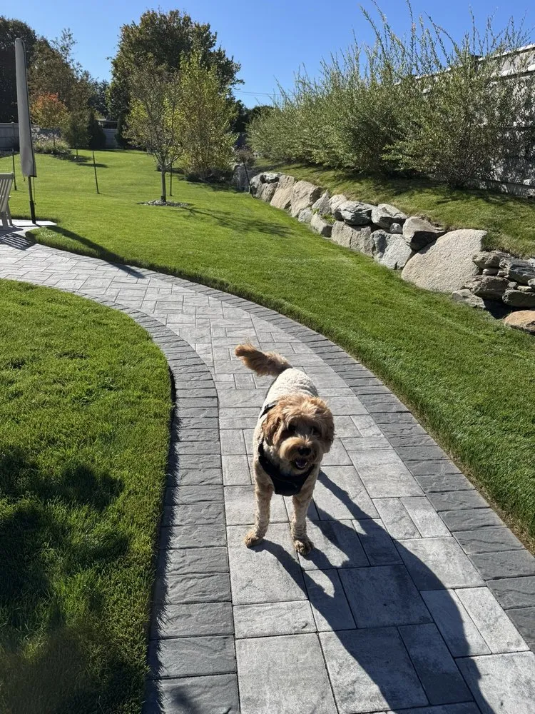 Professional lawn mowing service in Fall River, MA by Genos Landscaping