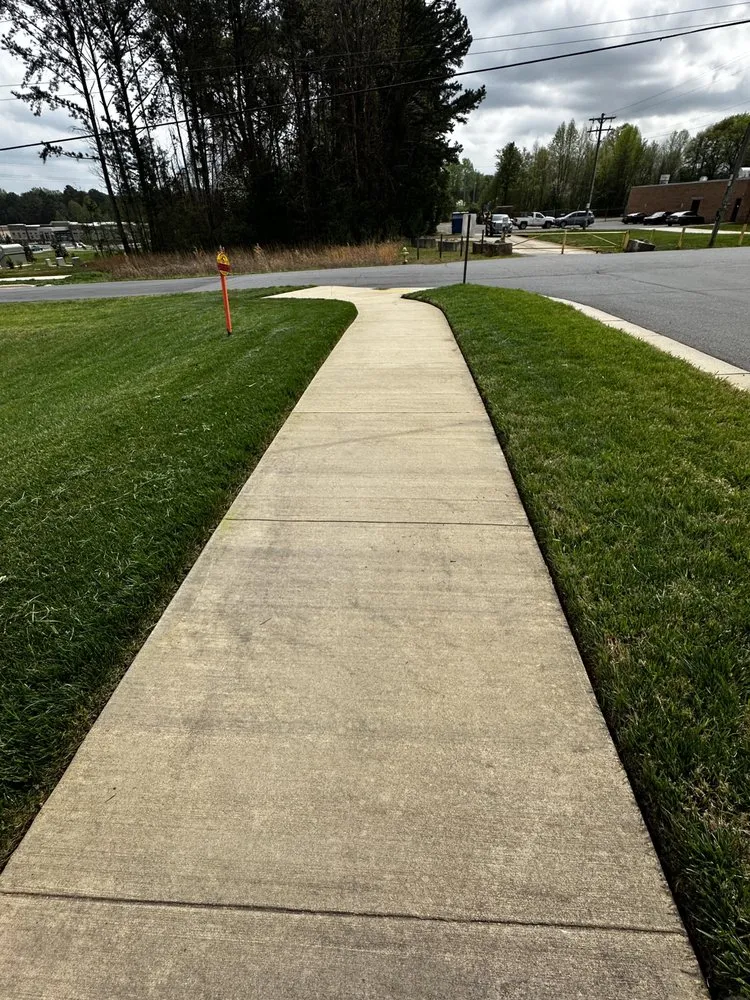 Custom lawn mowing service for outdoor upgrades across Charlotte, NC - Genova Landscape