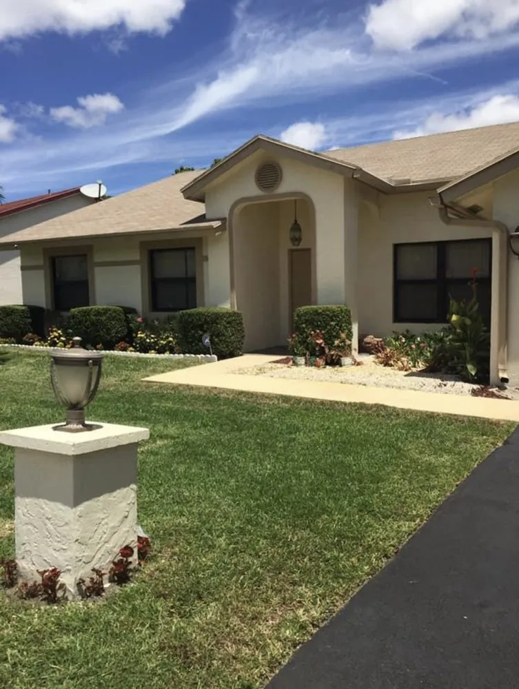 Trusted lawn mowing service for year-round maintenance in Miami, FL by Genuine Care Landscaping