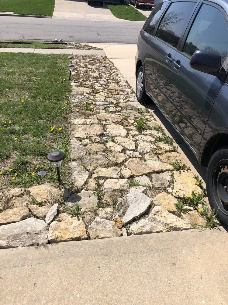 Expert lawn care service experts serving Olathe, KS - Genuine Home Repairs