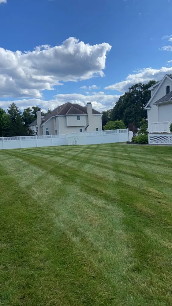 Professional lawn mowing service with custom design in Methuen, MA by Geo Landscaping