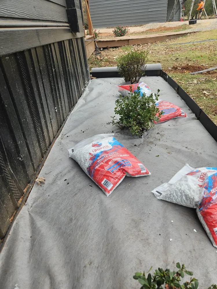 Custom garden landscaping for year-round maintenance in Norman, OK by Geo Trees Service