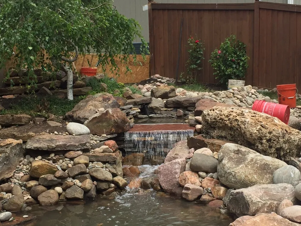 Affordable lawn mowing service for outdoor upgrades in Lawrence, KS by George Osborne Landscape Design