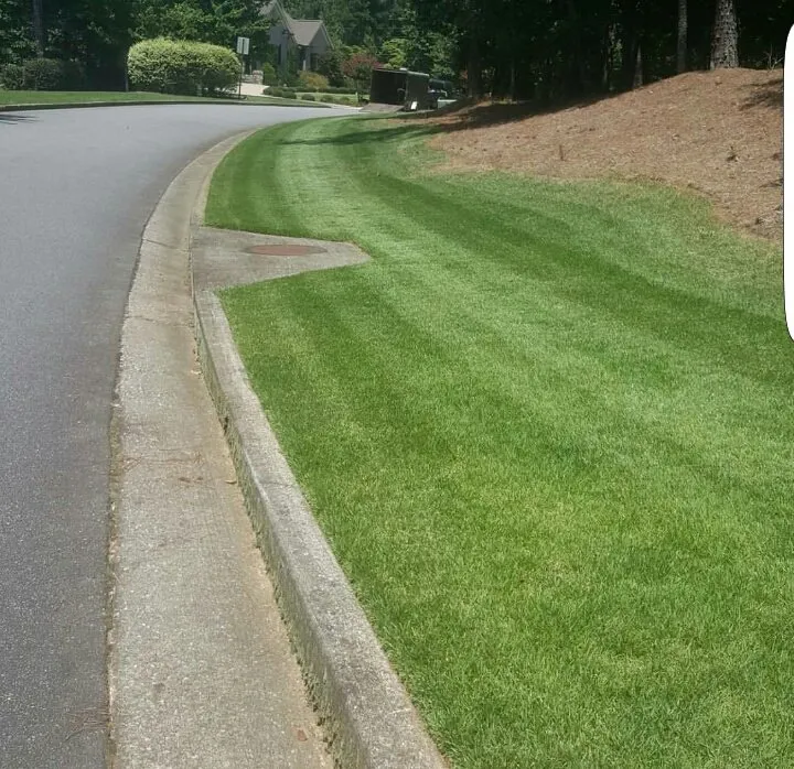 Custom lawn mowing service for year-round maintenance in Cartersville, GA by Georgia Environmental Landscape Mangement