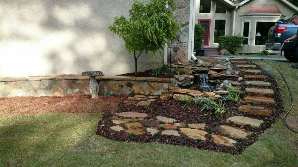 Custom residential landscaping with custom design in Norcross, GA by Georgia Fence Company