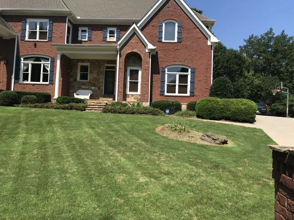 Custom landscape installation for residential properties in Lawrenceville, GA by Georgia Grounds Management