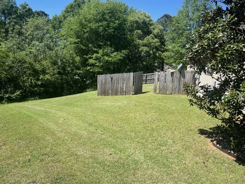 Expert lawn mowing service for homes in Elko, GA by Georgia Roots Outdoor Living