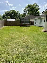Affordable lawn mowing service in Rincon, GA by Geos Lawn Services