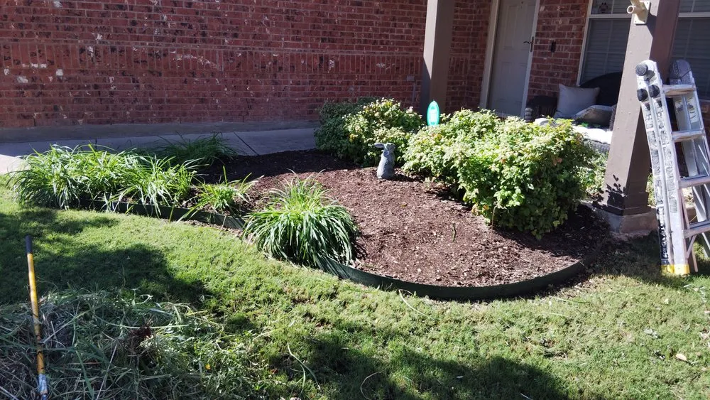 Custom yard cleanup service for residential properties in Watauga, TX by Get It Dunn Tree Service and Landscaping