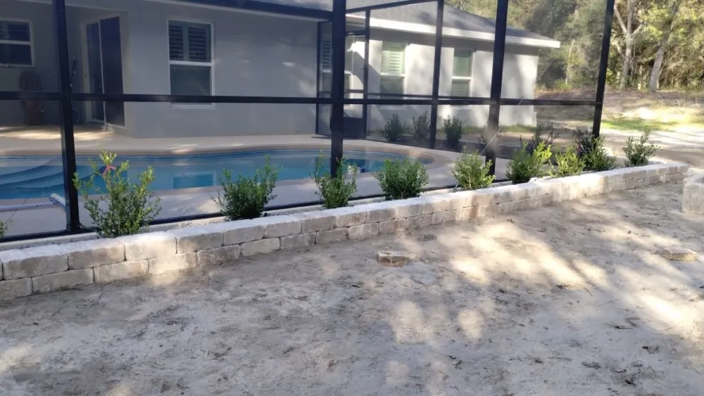 Professional landscape installation in Dunnellon, FL by Get R Green Sod and Landscaping