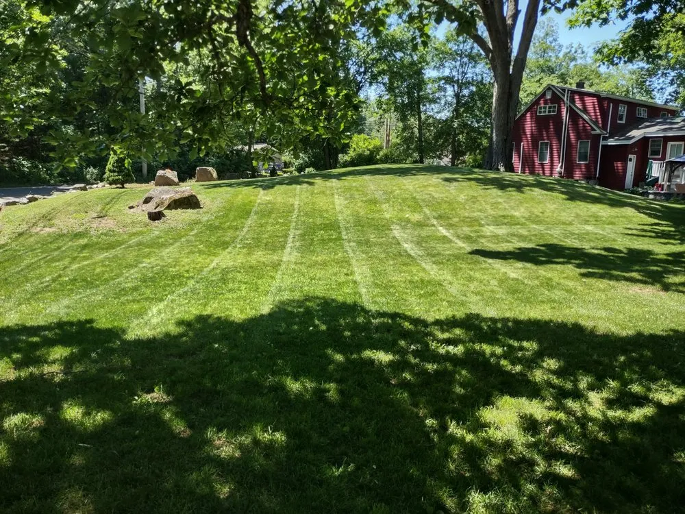 Custom lawn care service for year-round maintenance in Salem, NH by Getchell Property Services