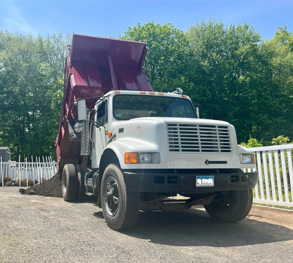 Trusted lawn mowing service for year-round maintenance in Branford, CT by G&G Earth Materials