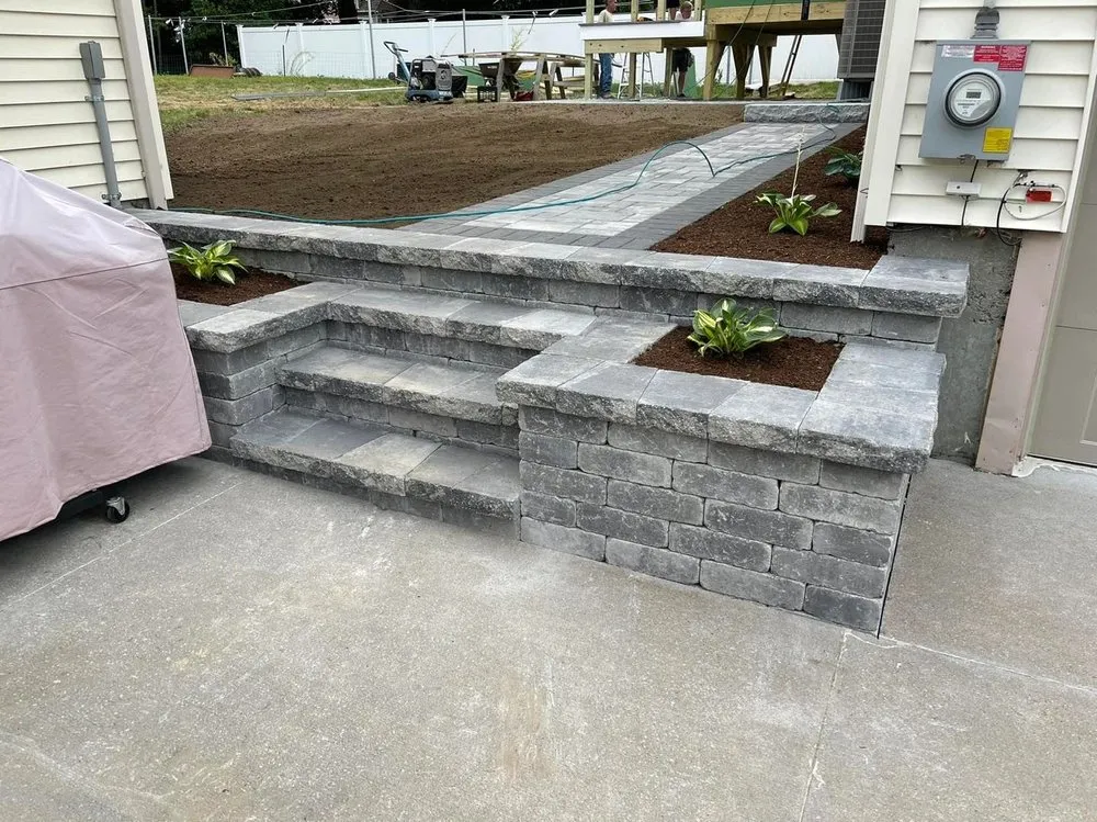 Custom yard cleanup service for outdoor upgrades in Franklin, MA by G&G Landscape Design
